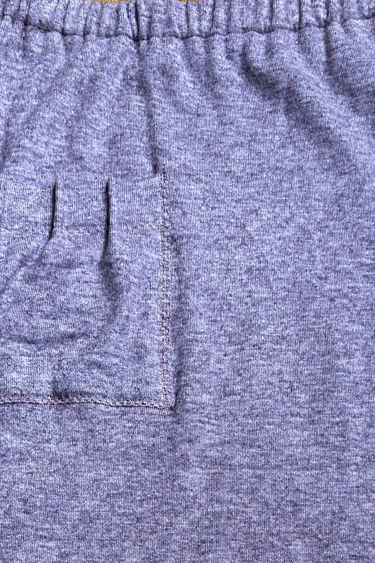 MIDIROCK AUS STRUKTURIERTEM JERSEY IN MAUVE